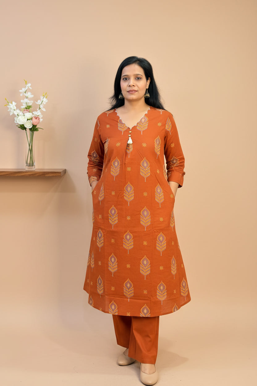Rust Color Cotton Printed A-Line Suit Set with Embroidered Pockets & Elastic Pant