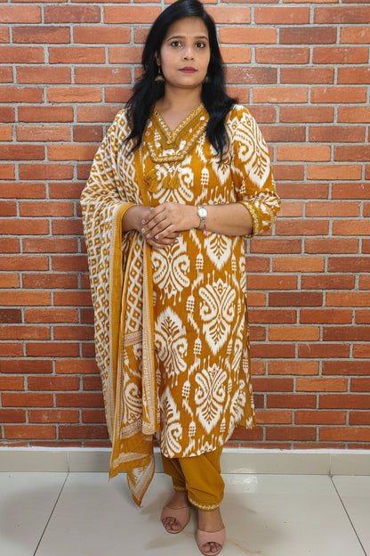 MUSTARD IKKAT PRINT MUL COTTON SUIT SET