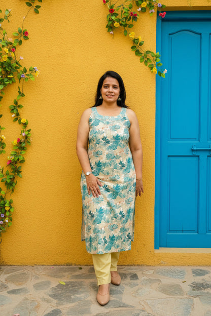 Beige Rayon Printed Sleeveless Kurti Pant Set .